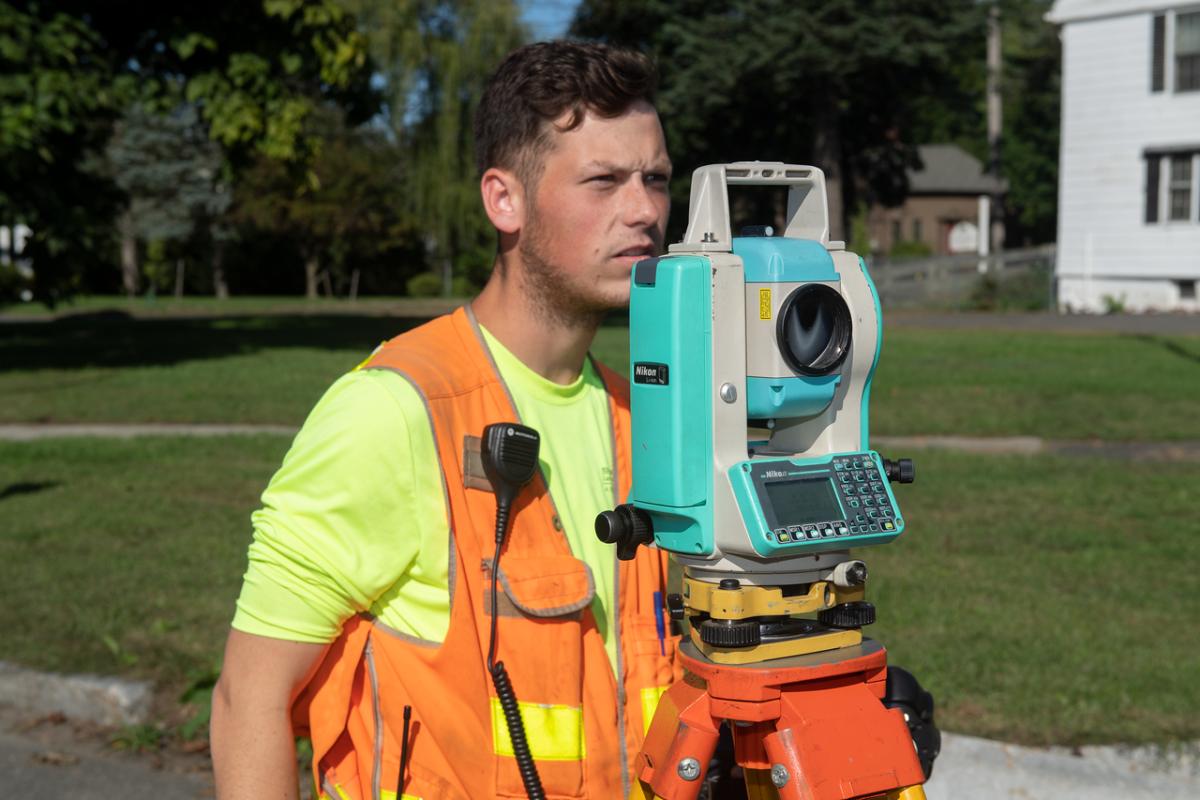 An Urban and Planning student participates in a geographical survey.