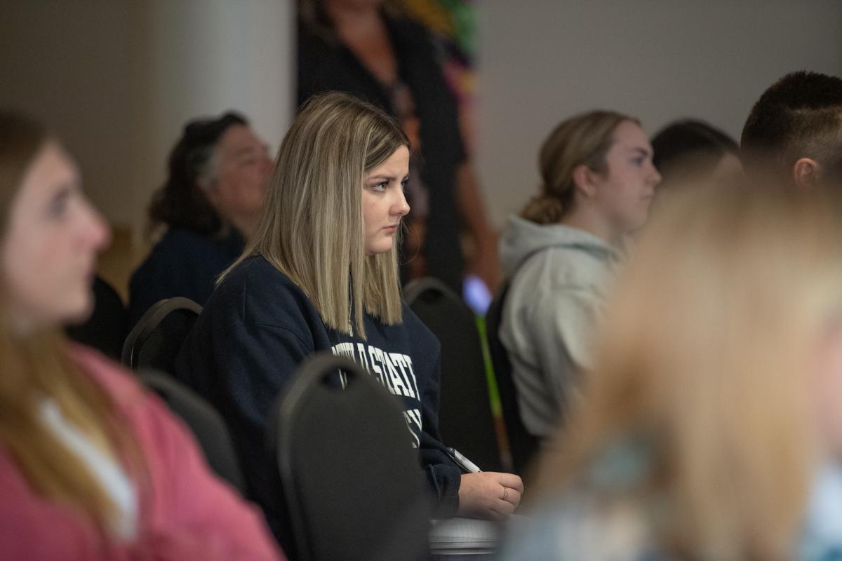 EGST student listening at film screening event 