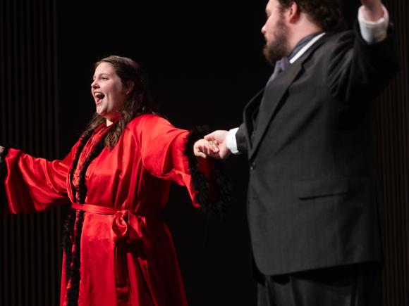 Two students presenting in Westfield State University Music Department's Die Fledermaus.