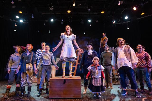 Cast of the theater production Peter & the Starcatcher onstage in the Ely Black Box Theater