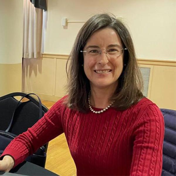 Dr. Erin Moore, Accounting and Finance Department Coordinator at Westfield State University, smiles for a photo.