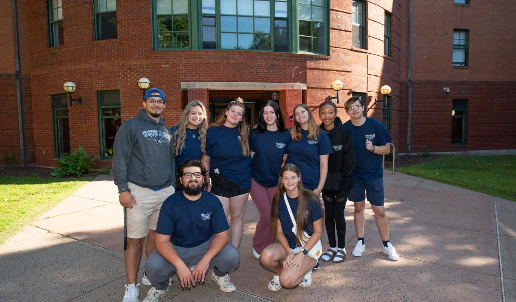 Group photo of students during Move-In Day in front of Courtney Hall.